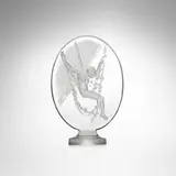 Figurine se balançant seal by René Lalique, c. 1919, clear and frosted glass, sold Oct 2023