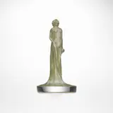 René Lalique, Statuette drapée seal, c. 1912, clear and frosted glass with green patina