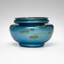Leaf and Vine bowl by Tiffany Studios, c. 1918, hand-blown Favrile glass, iron, sold Oct 2023
