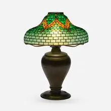 Ribbon table lamp by Tiffany Studios, c. 1910, leaded glass, patinated bronze, sold Oct 2023