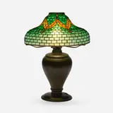 Tiffany Studios, Ribbon table lamp, c. 1910, leaded glass, patinated bronze