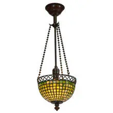 domed hanging shade with wirework by Tiffany Studios, sold Mar 2021