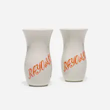 Alexander Girard, vases from La Fonda del Sol, pair, c. 1960, glazed porcelain with applied decoration