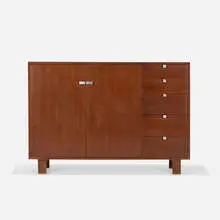 cabinet, model 4937 by George Nelson & Associates, 1946, walnut, matte chrome-plated brass, sold Mar 2018