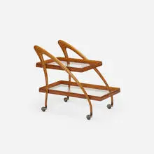 bar cart by Cesare Lacca, c. 1940, Italian walnut, glass, brass, sold Jan 2018
