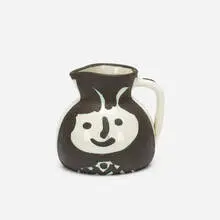 Pichet têtes by Pablo Picasso, 1956, white earthenware clay, oxidized paraffin decoration, white enamel, sold Jan 2018