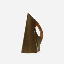 pitcher by Hagenauer, c. 1950, brass, fruitwood, sold Jan 2018
