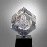 Jon Kuhn, Untitled (Large cube on stand), ground, polished, and laminated glass, stainless steel, painted wood, motorized base