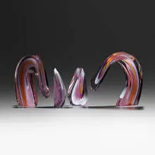 Double Arc by Harvey Littleton, 1984, cased, hot-worked, cut, and polished glass, sold Oct 2023