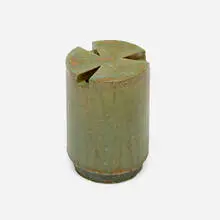 Cylindrical form with three triangular openings by Otto Natzler, 1981, earthenware with Patina Mat glaze, sold Oct 2023