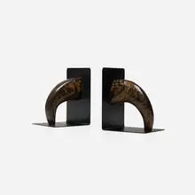 bookends model 4773, pair by Carl Auböck III, 1958, horn, enameled steel, sold Jan 2018