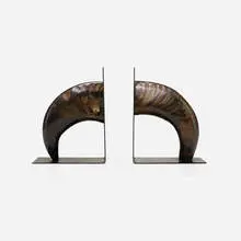 bookends model 4773, pair by Carl Auböck III, 1958, horn, enameled steel, sold Jan 2018