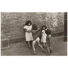 New York (Boy Lifting Skirt) by Helen Levitt, 1942, Gelatin silver print, sold Apr 2026
