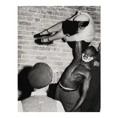 Weegee, Untitled (Man Lifting Woman with One Hand), c. 1950, Gelatin silver print
