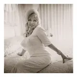 Diane Arbus, Mae West on her bed, Santa Monica, CA, 1964, Gelatin silver print; the 'A Diane Arbus Print' stamp