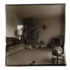 'Parlor, Xmas, Levittown' (Xmas tree in a living room in Levittown, L.I.) by Diane Arbus, 1962, Gelatin silver print, probably printed between 1965 and 1970; signed, sold Apr 2026