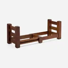 Adjustable book rack by Gustav Stickley, c. 1904-07, oak, sold Jun 2026