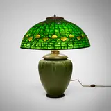 Vine Border (Acorn) table lamp by Ruth Erickson for Grueby Faience Company and Tiffany Studios, sold Jun 2026