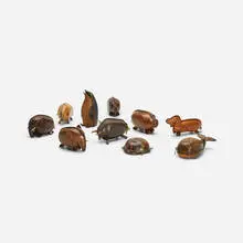 Kounoike, collection of ten piggy banks, c. 1960, leather, brass