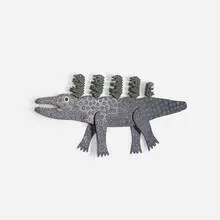 Alligator by Tubby Brown, c. 1990, hand-cut and painted wood, sold Oct 2017