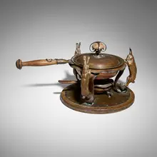 Joseph Heinrichs, Chafing dish with three rabbits, c. 1905, handwrought and cast copper, oak, bronze