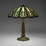 Bradley & Hubbard, Large overlay table lamp, c. 1915, patinated iron, slag glass