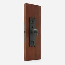 Door knobs and back plates from the Wainwright Building, St. Louis, Missouri by Dankmar Adler and Louis Sullivan, c. 1891, Bower-Barff-finished wrought iron, wood, sold Mar 2026