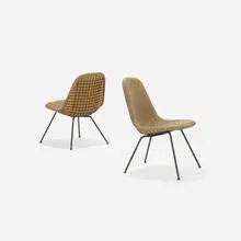 LKX-1s, pair by Charles and Ray Eames, 1950 / 1951, enameled steel, upholstery, sold Sep 2017