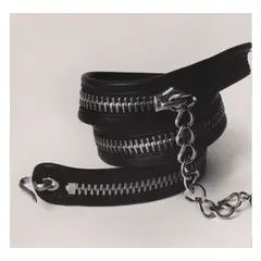 Chanel Zipper Belt (for 'Vogue') by Irving Penn, 1967, Gelatin silver print; the photographer's credit stamp and a Condé Nast reproduction rights stamp on the reverse, sold Jan 2026