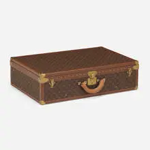 Louis Vuitton, Large suitcase and cover, c. 1980
