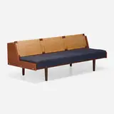 Daybed, model GE 6 by Hans J. Wegner, c. 1965, teak, painted wood, upholstery, caning, chrome-plated steel, sold Jul 2023
