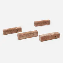 Frank Lloyd Wright, Architectural fragments from Francisco Terrace, Chicago, set of four, c. 1895-96, terracotta