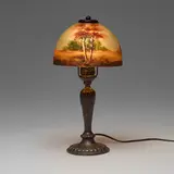 Jefferson Electric Company, Boudoir lamp with autumn landscape, c. 1920, acid-etched and reverse-painted glass, bronzed metal