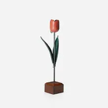 Untitled (Tulip) by Folk Art, c. 1900, painted cast iron, walnut, sold Jul 2017