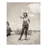 Frank Worth, Elizabeth Taylor with Lasso on set of 'Giant', 1955, Platinum print