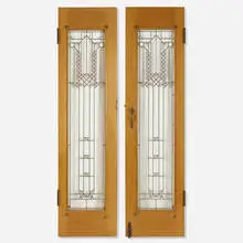 Frank Lloyd Wright, Doors from Northome, the second Francis W. Little House, Wayzata, Minnesota, pair, 1912-14, opaque and clear glass, copper-plated zinc came, oak, brass