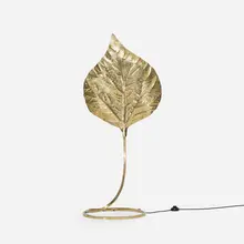 floor lamp by Tommaso Barbi, c. 1970, brass, sold Jul 2017