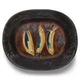 Trois sardines (Ramié 34) by Pablo Picasso, 1948, Glazed white earthenware clay dish painted in yellow, brown, blue and straw-color, sold Apr 2026
