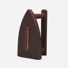 Cadeau by Man Ray, cast iron, steel tacks, sold Jun 2023