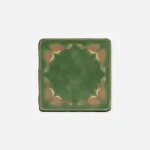 Trivet tile with geese by Grueby Faience Company, c. 1905, glazed earthenware decorated in cuenca, sold Jun 2025