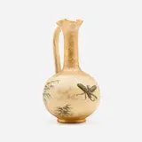 Dull Finish ewer with stag beetle and nail head decoration by Albert R. Valentien for Rookwood Pottery, 1883, glazed and gilt earthenware, sold Jun 2025