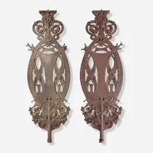 Balusters from the Guaranty Building, Buffalo, New York, pair by Dankmar Adler and Louis Sullivan, c. 1896, cast iron, sold Mar 2025
