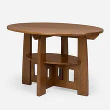 Double oval table, model 158 by Limbert, c. 1910, oak, sold Mar 2025