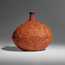 Vase by William and Polia Pillin, c. 1955, volcanic-glazed ceramic, sold Apr 2023