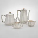 Four-piece tea and coffee service by The Kalo Shop, sold Dec 2024