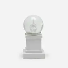 L.O.V.E. snow globe by Maurizio Cattelan, 2014, resin, glass, concrete, sold Jun 2017