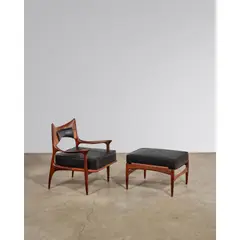 Phillip Lloyd Powell, Rare Chair and Ottoman, sculpted walnut, webbing, black leather re-upholstery by Lobel Modern