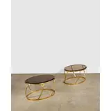 Pair of 'Onyx' Occasional Tables by Karl Springer, , glass, polished brass, sold Mar 2026