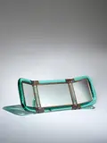 Karl Springer, Illuminated Vanity Mirror, for Seguso Vetri d'Arte, tinted glass, mirror plate, bronze mounts, engraved 'KARL SPRINGER'