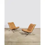 Arne Norell, Pair of 'Ari' Lounge Chairs, for Norell, leather and chrome-plated steel, decal manufacturer's label 'NORELL Made in Sweden'